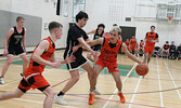 The Sioux Lookout Warriors in action against the Westgate Collegiate and Vocational Institute Tigers in Game 1 of the NWOSSA AA Senior Boys Basketball Championship held at SNHS.     Tim Brody / Bulletin Photo