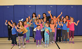 Manuela Michelizzi (back, centre) with Sioux Lookout Sparks and Brownies Girl Guide Units, after teaching them dance moves in March of 2015. - File photo