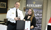 OPP North West Region Chief Superintendent/Regional Commander Bryan MacKillop presents Natasha Perreault with the Commissioner’s Citation for Lifesaving and a St John Ambulance Life Saving Certificate.   Tim Brody / Bulletin Photo