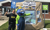 Sioux Lookout OPP Community Mobilization/Safety Officer Constable Andrea DeGagne with Blueberry Festival mascot Blueberry Bert. - Tim Brody / Bulletin Photo