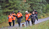 Sioux Lookout Mayor Doug Lawrance (second from the right) and OPP Constable Andrea DeGagne (middle) joined participants during an Orange Shirt Day walk from the Frog Rapids Bridge to the Travel Information Centre. - Jesse Bonello / Bulletin Photos