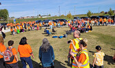 Staff and students from Sacred Heart School visit the Town Beach to participate in Orange Shirt Day activities.    Photo courtesy of Sacred Heart School
