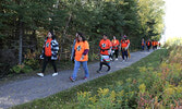 Orange Shirt Day Walk participants on the Umfreville Trail on Sept. 29.   Tim Brody / Bulletin Photo