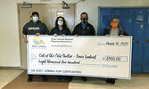 From left: Out of the Cold Shelter employee Scott Semple, SLRPSI Co-Chair Joanne Fry, SLRPSI Co-Chair Howard Meshake, and Out of the Cold Shelter Executive Director Susan Barclay holding the donation cheque.       Reeti Meenakshi Rohilla / Bulletin Photo