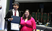 Tyron Moose receives the Senior Math Award from teacher Melanie Shine.    Tim Brody / Bulletin Photo