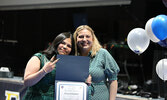 Alyssa Kakegamic receives the Senior Perseverance Award from teacher Lauren Berlinguette.   Tim Brody / Bulletin Photo