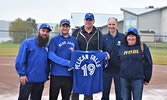 The Jays Care Foundation presented a custom Pelican Falls Toronto Blue Jays jersey to the school. From left: A.J. Haapa, Shawn Hordy, Darrin Head, Robert Witchel, and Norma Kejick. - Jesse Bonello / Bulletin Photo