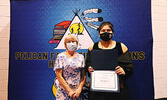 Blaze Hudson receiving the Jr. English Award from Mrs. King. Blaze also received the Student Ambassador Award.   Photos courtesy of Pelican Falls First Nations High School