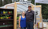 Kelli George-Egerter (left) and BJ Egerter on The Painted Turtle Farm greenhouse’s opening day last weekend.     Reeti Meenakshi Rohilla / Bulletin Photo