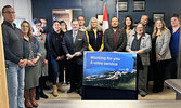 Dignitaries pose for a photo during the grand opening of the new ServiceOntario centre in Pickle Lake.    Sol Mamakwa / Facebook