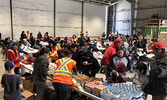 Evacuees were provided with blankets, refreshments, sandwiches and fruit while they waited to be flown to their host communities.  - Tim Brody / Submitted Photo