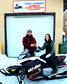 Mark Ridgeway (left) presents Sheila Suprovich with her new snowmobile after winning the annual sled draw. - OPTA / Submitted Photo