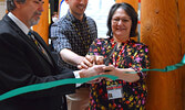From left: Sioux Lookout Meno Ya Win Health Centre (SLMHC) President and CEO Dean Osmond, SLMHC Chief of Mental Health and Addictions Dr. Justin Bell, and SLMHC Vice President Indigenous Services Kathy Loon cut the ribbon to symbolize the official grand o