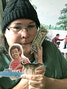 Rachel Garrick holding the cut-out images used to create illustrations for her film.      Jeff Bursey / Submitted Photo