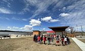 Community members take part in a round dance during a special ceremony at the town beach on Red Dress Day, May 5.   Tim Brody / Bulletin Photo
