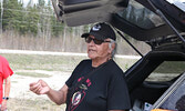 Lac Seul First Nation Elder Fred Thomas offers a prayer before the Red Dress Day Walk gets underway.     Tim Brody / Bulletin Photo