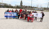 Lac Seul First Nation community members came together on May 12 to take part in a Red Dress Day Walk in the First Nation to honour and raise awareness for First Nations, Inuit, and Métis woman, girls, and 2SLGBTQI+ persons who have gone missing or been mu