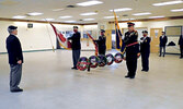 Edwin Switzer Memorial Sioux Lookout Legion, Branch #78 President Kirk Drew (left) instructs the colour guard during the Legion’s virtual Remembrance Day service, which included the laying of wreaths. - Screenshots of Sioux Lookout Legion Remembrance Day 