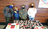 The McCord family lovingly painted poppies on rocks, which they sold at Fresh Market Foods on Oct. 30 for a donation to the Sioux Lookout Legion’s Poppy Campaign. The family painted more rocks last week. Their efforts have now raised over $1600. From left