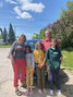 Alice Gwyn (left) and Mark Walton (right) stand with their three daughters for a family road trip photo. The family took their Chevy Bolt Electric Vehicle (EV) to British Columbia and back, the longest trip they have attempted with the Bolt as a family.  