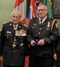 Ron Laverty (right) receiving his 30-year bar from Lieutenant General Richard Rohmer. - Anthony Sharp / Submitted Photo