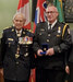 Ron Laverty (right) receiving his 30-year bar from Lieutenant General Richard Rohmer. - Anthony Sharp / Submitted Photo