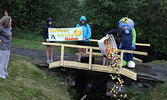 Sioux Lookout Blueberry Festival mascot Blueberry Bert watches as Sioux Lookout Skating Club members release hundreds of rubber ducks into the creek at the Sioux Lookout Golf and Curling Club on August 5 for the club’s Rubbery Ducky Race fundraiser.     T