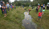 Visitors to the Sioux Lookout Golf and Curling Club take in the Rubber Ducky Race.