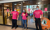 Sioux North High School Principal Darryl Tinney (left), Vice-Principal Andy Schardt (right) and staff member Sheila Suprovich (centre) show their Pink Shirt Day spirit on Feb. 23.   Sioux North High School / Submitted Photo