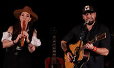 Husband and wife duo Twin Flames brought their own unique brand of folk/rock to the Sioux North High School Cafetorium on March 17. Chelsea June (left) and Jaaji performed songs honoring their combined Metis, Inuk and Mohawk heritage.   Mike Lawrence / Bu