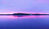 2nd place – Sioux Mountain Sunset Reflecting on Ice by Twylla Penner.      Photo courtesy Municipality of Sioux Lookout / Twylla Penner