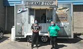 SLAAMB’s Assistant Coordinator Ziggy Beardy (left) and SLAAMB Coordinator Mary Tait (right) at the SLAAMB Stop food truck on its closing day on July 29.     Reeti Meenakshi Rohilla / Bulletin Photo