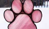 A stained glass paw print made by the Poirier family. - Submitted Photo