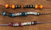 Bracelets bearing the message Be Kind, created by Sarvin, 8, Navin, 5, and Saaviya, 3.  - Photo Courtesy Dr. Neety Panu