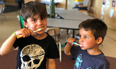Through the Brushing Program, students participate in brushing their teeth as well as flossing  at least once during the school day. - JoAnne Van Horne / Submitted Photo