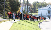 Students from Sioux North High School walked around their school’s block in support of IRS survivors and children who never returned home from the schools.      Tim Brody / Bulletin Photo