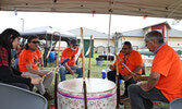 From left: A Sioux North High School student joins Nishnawbe-Gamik Friendship Centre staff members Allan Walski, Eric Anderson from Shibogama Education, Victor Lyon and Tom Chisel in drumming on Sept. 30.      Tim Brody  / Bulletin Photo