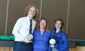 Eric Goretzki (left) and Kailey Barnes (right) receive the Colin Hood Award from SNHS Athletic Director Janine Lavoie.   Tim Brody / Bulletin Photo