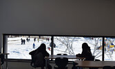 Students checked out the view from their new library, which looks on to the playground at Sioux Mountain Public School. - Jesse Bonello / Bulletin Photo