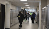 Students finding their new classrooms. Classes were beginning throughout the day on March 18. - Jesse Bonello / Bulletin Photo
