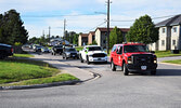 Led by their Sioux Lookout Fire Department escort, staff from Sioux North High School travelled around town celebrating and congratulating this year’s graduates. - Jesse Bonello / Bulletin Photo