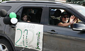 SNHS teacher Rob Sakamoto waves to graduates.     Tim Brody / Bulletin Photo