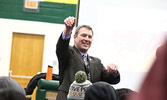 KPDSB Director of Education Sean Monteith joins the moving announcement celebration fun, helping toss SNHS t-shirts to students.  - Tim Brody / Bulletin Photo