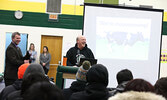 SNHS Principal Wayne Mercer (at podium) shares the news with students they are moving, before handing the mic off to KPDSB Director of Education Sean Monteith who announced the official move in date. - Tim Brody / Bulletin Photo