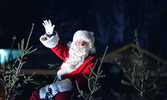 Santa Claus waves to the crowd during last year’s parade in Sioux Lookout.   Bulletin File Photo