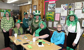 From left: Judi Hindy, Carol Maxell, Lee Martin, Joan Kydd, Gail Winter, Alana Procyk, Karen Boyko, Jacquie Southwell and “leprechaun” Eileen Jeffery.   Tim Brody / Bulletin Photo