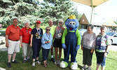 Predicted walk organizers and participants with Blueberry Bert, from left: Wally Glena, Aileen Urquhart, Joyce Timpson, Lee Martin, Doug Squires, Lisa Larsh, Bluberry Bert, Sue Bowcock and Donna Prior. - Tim Brody / Bulletin Photo