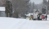 OPP officers and members of the fire department at the scene of the fire.   Tim Brody / Bulletin Photo