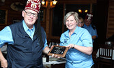 McKechnie (left) presents Tara Drew of Drew Osteopathy with a plaque in recognition of her and her business’s support for Khartum Shriners fundraising efforts to help children. - Tim Brody / Bulletin Photos
