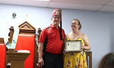 Remedy’s Rx employee Shannon Brody (right) accepts a certificate of appreciation from Potentate Denis Lorteau on behalf of Sioux Lookout Shrine Club member Bryan Neufeld/Remedy’s Rx.